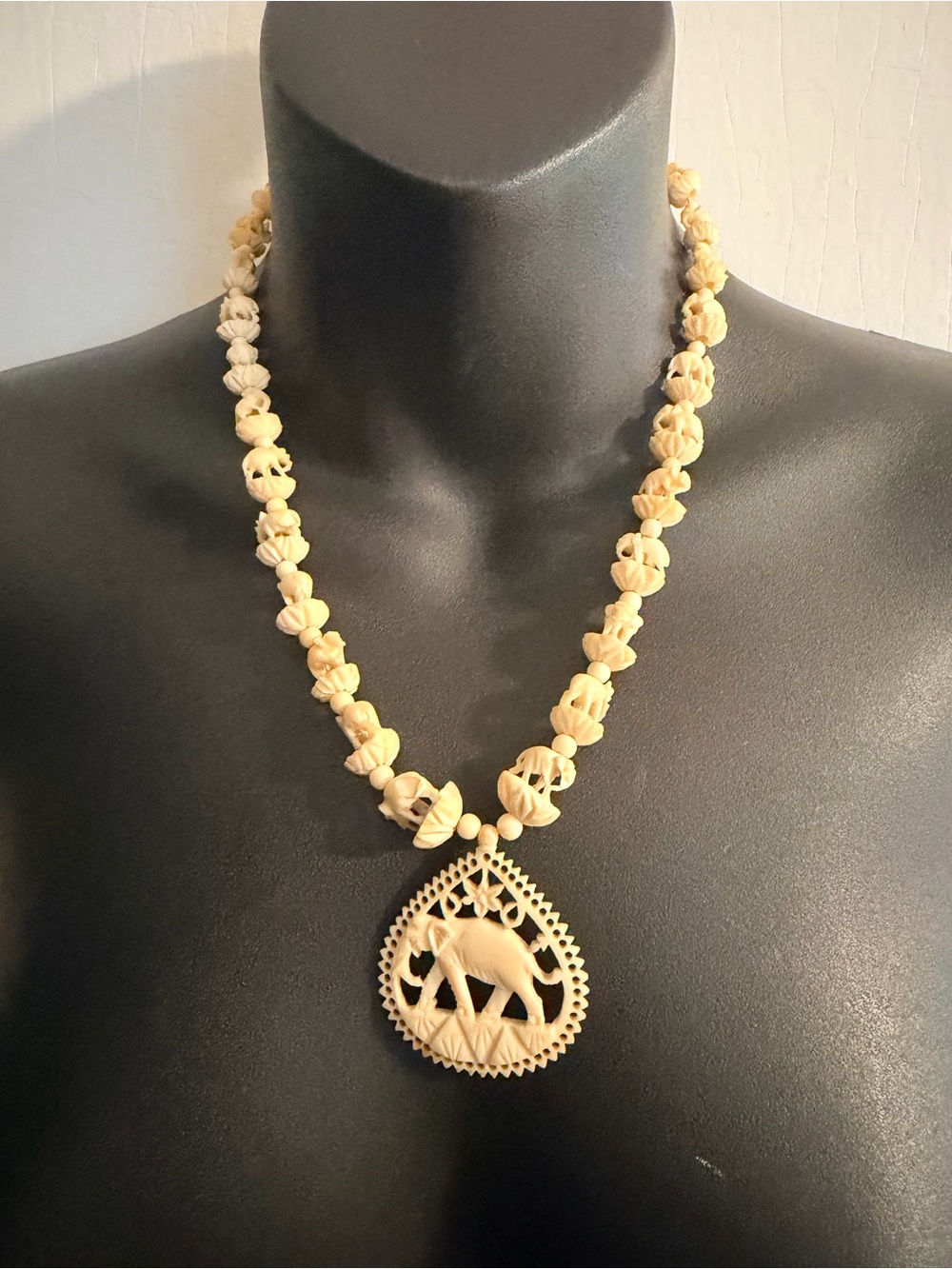 Vintage carved bone elephant necklace